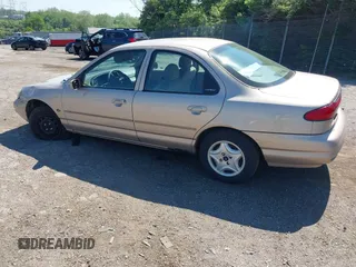 1999 Ford Contour with VIN 1FAFP653XXK134482, listed as a IAAI auction lot 42224788 with 92,501 mi miles and . Bid and sale history available at DreamBid. Image 3.