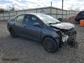 2011 Toyota Yaris with VIN JTDBT4K33B4081330, listed as a Copart auction lot 52358525 with 138,352 mi miles and Salvage Title. Bid and sale history available at carsss.com. Image 4.