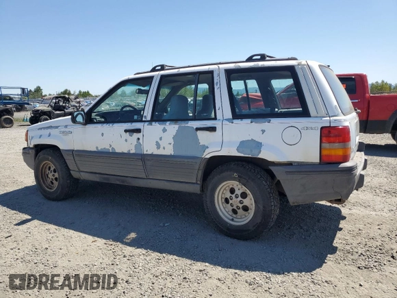 1993 Jeep Grand Cherokee Laredo с VIN 1J4GZ58S2PC654248, выставлен на аукционе Copart как лот 61259735 с пробегом 251 360 миль миль и Списание • Salvage title. История ставок и продаж доступна на DreamBid. Изображение 2.