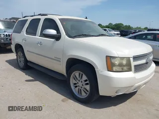 2011 Chevrolet Tahoe LTZ z VIN 1GNSCCE09BR118788, wystawiony jako IAAI lot #42262852 z przebiegiem 205 079 mil mil oraz . Historia ofert i sprzedaży dostępna na DreamBid. Obrazek 1.