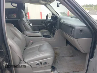 2004 Chevrolet Tahoe LT with VIN 1GNEC13Z74J314927, listed as a IAAI auction lot 41231288 with 195,809 mi miles and . Bid and sale history available at DreamBid. Image 5.