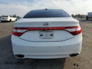 2013 Hyundai Azera с VIN KMHFH4JG4DA330015, выставлен на аукционе Copart как лот 62757555 с пробегом 128 339 миль миль и Чистый • Clean title. История ставок и продаж доступна на DreamBid. Изображение 6.
