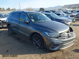 2023 Volkswagen Tiguan SE with VIN 3VVNB7AXXPM134334, listed as a IAAI auction lot 41038481 with 14,127 mi miles. Bid and sale history available at carsss.com. Image 1.