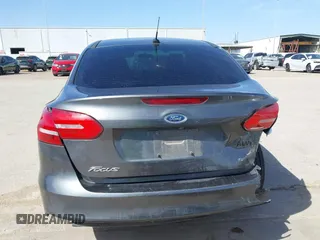 2018 Ford Focus SE with VIN 1FADP3F2XJL302358, listed as a IAAI auction lot 41807622 with 76,145 mi miles. Bid and sale history available at carsss.com. Image 16.