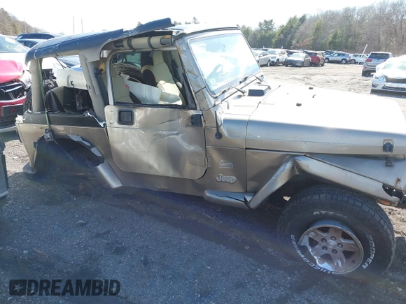 2004 Jeep Wrangler Sahara with VIN 1J4FA59S14P772264, listed as a IAAI auction lot 41814074 with 165,750 mi miles and . Bid and sale history available at DreamBid. Image 6.