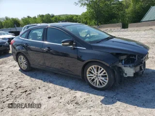 2015 Ford Focus Titanium with VIN 1FADP3J2XFL200489, listed as a Copart auction lot 56443215 with 139,990 mi miles and Clean title. Bid and sale history available at DreamBid. Image 4.