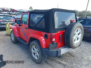 2014 Jeep Wrangler Sahara with VIN 1C4AJWBG0EL109773, listed as a IAAI auction lot 41678412 with 12,264 mi miles and . Bid and sale history available at DreamBid. Image 3.
