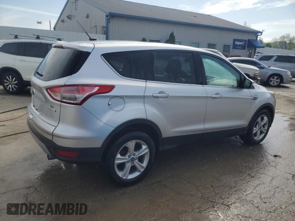 2013 Ford Escape SE z VIN 1FMCU0GXXDUA47275, wystawiony jako Copart lot #52241145 z przebiegiem 157 724 mil mil oraz Nie do naprawy • Non repairable. Historia ofert i sprzedaży dostępna na DreamBid. Obrazek 3.