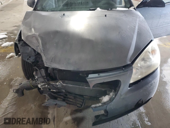 2006 Pontiac G6 with VIN 1G2ZF55BX64180297, listed as a Copart auction lot 41562225 with 206,046 mi miles and Salvage title. Bid and sale history available at DreamBid. Image 11.