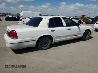 1999 Ford Crown Victoria Police with VIN 2FAFP71WXXX198735, listed as a Copart auction lot 70526134 with 116,889 mi miles and Clean Title. Bid and sale history available at carsss.com. Image 3.