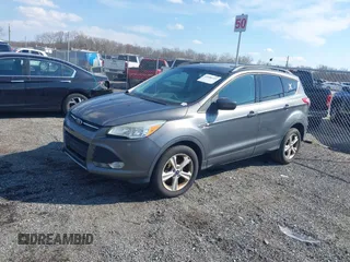 2014 Ford Escape SE with VIN 1FMCU9G98EUD26411, listed as a IAAI auction lot 41686493 with 132,644 mi miles. Bid and sale history available at carsss.com. Image 2.