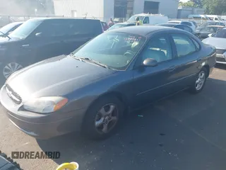 2002 Ford Taurus SES Standard z VIN 1FAFP55U22A172533, wystawiony jako IAAI lot #42680611 z przebiegiem 122 306 mil mil oraz . Historia ofert i sprzedaży dostępna na DreamBid. Obrazek 2.