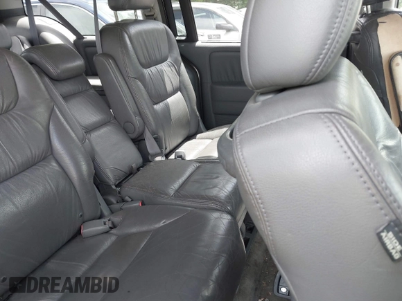 2005 Honda Odyssey EX-L with VIN 5FNRL38745B083510, listed as a IAAI auction lot 42534287 with 304,298 mi miles and . Bid and sale history available at DreamBid. Image 8.