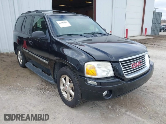 2002 GMC Envoy SLT with VIN 1GKDT13S622506181, listed as a IAAI auction lot 41986061 with 212,583 mi miles. Bid and sale history available at carsss.com. Image 1.
