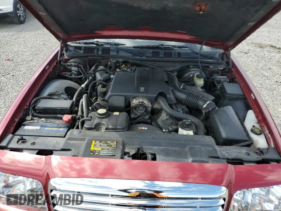 2003 Ford Crown Victoria LX z VIN 2FAFP74W43X100336, wystawiony jako Copart lot #51004035 z przebiegiem 82 089 mil mil oraz Szkoda całkowita • Salvage title. Historia ofert i sprzedaży dostępna na DreamBid. Obrazek 11.
