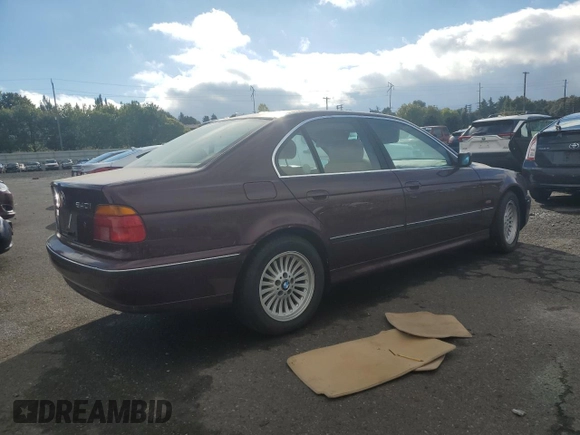 1997 BMW 5 Series 540i z VIN WBADE6320VBW54072, wystawiony jako Copart lot #74403104 z przebiegiem 98 910 mil mil oraz Czysty tytuł • Clean title. Historia ofert i sprzedaży dostępna na DreamBid. Obrazek 3.
