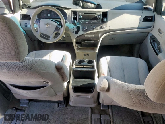 2012 Toyota Sienna LE AAS с VIN 5TDKK3DC7CS183942, выставлен на аукционе Copart как лот 57597305 с пробегом 245 971 миль миль и Списание • Salvage title. История ставок и продаж доступна на DreamBid. Изображение 8.
