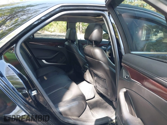 2009 Cadillac CTS RWD w/1SB with VIN 1G6DU57V590105458, listed as a IAAI auction lot 42139093 with 105,983 mi miles. Bid and sale history available at carsss.com. Image 8.