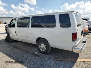 2009 Ford Econoline Passenger XL with VIN 1FBSS31L99DA06824, listed as a Copart auction lot 73740824 with 147,528 mi miles and Salvage title. Bid and sale history available at DreamBid. Image 2.
