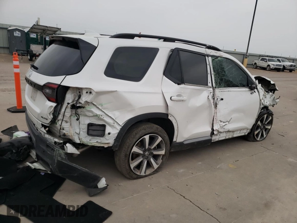 2023 Honda Pilot Elite z VIN 5FNYG1H81PB045653, wystawiony jako Copart lot #51252065 z przebiegiem 57 388 mil mil oraz Szkoda całkowita • Salvage title. Historia ofert i sprzedaży dostępna na DreamBid. Obrazek 3.