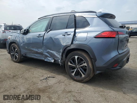 2024 Toyota Corolla Cross Hybrid S with VIN 7MUFBABG0RV053138, listed as a Copart auction lot 59515915 with 7,065 mi miles and Salvage title. Bid and sale history available at DreamBid. Image 2.