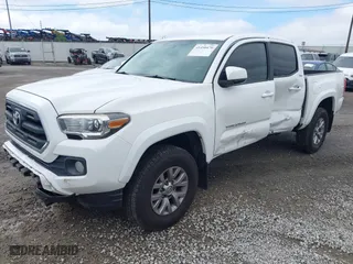 2017 Toyota Tacoma SR5 with VIN 3TMAZ5CN9HM040066, listed as a IAAI auction lot 41490470 with 119,221 mi miles. Bid and sale history available at carsss.com. Image 17.