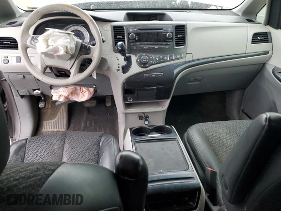 2014 Toyota Sienna SE с VIN 5TDXK3DC1ES519741, выставлен на аукционе Copart как лот 53892035 с пробегом Не указан миль и Списание • Salvage title. История ставок и продаж доступна на DreamBid. Изображение 8.