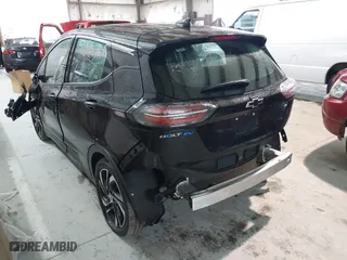 2023 Chevrolet Bolt EV 2LT with VIN 1G1FX6S03P4184237, listed as a IAAI auction lot 41565141 with 80,603 mi miles. Bid and sale history available at carsss.com. Image 3.