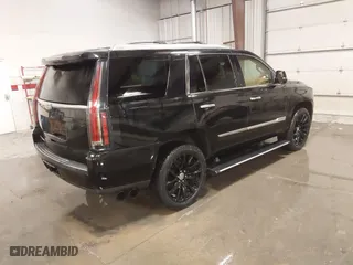 2015 Cadillac Escalade Platinum with VIN 1GYS4PKJ9FR745825, listed as a IAAI auction lot 41201715 with 133,363 mi miles. Bid and sale history available at carsss.com. Image 4.