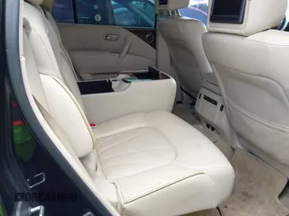 2011 Infiniti QX56 7-passenger with VIN JN8AZ2NF7B9502185, listed as a IAAI auction lot 42633171 with 213,363 mi miles and . Bid and sale history available at DreamBid. Image 8.