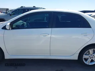 2013 Toyota Corolla L with VIN 5YFBU4EE1DP103528, listed as a IAAI auction lot 42111276 with 212,533 mi miles and . Bid and sale history available at DreamBid. Image 14.