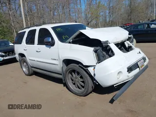 2007 GMC Yukon SLT z VIN 1GKFK13007J154903, wystawiony jako IAAI lot #41999533 z przebiegiem 251 095 mil mil oraz . Historia ofert i sprzedaży dostępna na DreamBid. Obrazek 1.