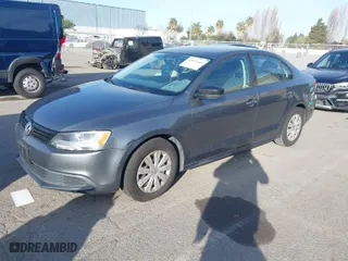 2014 Volkswagen Jetta Sedan S with VIN 3VW2K7AJ1EM290446, listed as a IAAI auction lot 41851440 with 115,291 mi miles. Bid and sale history available at carsss.com. Image 2.