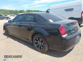 2015 Chrysler 300 with VIN 2C3CCABG1FH807740, listed as a IAAI auction lot 40246268 with 174,037 mi miles. Bid and sale history available at carsss.com. Image 3.