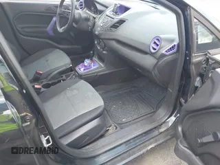 2018 Ford Fiesta S z VIN 3FADP4AJ0JM131607, wystawiony jako IAAI lot #42707624 z przebiegiem 109 815 mil mil oraz . Historia ofert i sprzedaży dostępna na DreamBid. Obrazek 5.