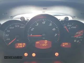 1997 Porsche Boxster с VIN WP0CA2984VS621039, выставлен на аукционе Copart как лот 60274455 с пробегом 59 619 миль миль и Списание • Salvage title. История ставок и продаж доступна на DreamBid. Изображение 9.