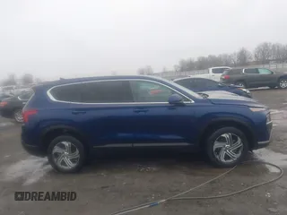 2022 Hyundai Santa Fe SE z VIN 5NMS14AJ8NH406846, wystawiony jako IAAI lot #41588202 z przebiegiem 34 006 mil mil oraz . Historia ofert i sprzedaży dostępna na DreamBid. Obrazek 13.
