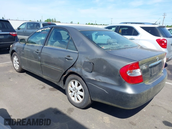 2003 Toyota Camry LE with VIN 4T1BE32K03U754857, listed as a IAAI auction lot 42224229 with Not Provided miles and . Bid and sale history available at DreamBid. Image 3.