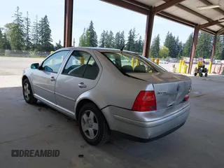 2000 Volkswagen Jetta GLS z VIN 3VWSA29M4YM195775, wystawiony jako IAAI lot #42131518 z przebiegiem 314 472 mil mil oraz . Historia ofert i sprzedaży dostępna na DreamBid. Obrazek 3.