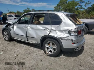 2012 BMW X5 35d with VIN 5UXZW0C51CL668064, listed as a Copart auction lot 62217845 with 140,544 mi miles and Salvage title. Bid and sale history available at DreamBid. Image 2.