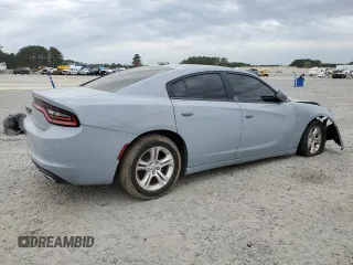 2021 Dodge Charger SXT with VIN 2C3CDXBG7MH522506, listed as a Copart auction lot 50197255 with 97,090 mi miles and Salvage Title. Bid and sale history available at DreamBid. Image 3.