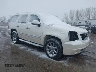 2010 GMC Yukon Denali z VIN 1GKUKEEF6AR275296, wystawiony jako IAAI lot #42063522 z przebiegiem 217 476 mil mil oraz . Historia ofert i sprzedaży dostępna na DreamBid. Obrazek 1.