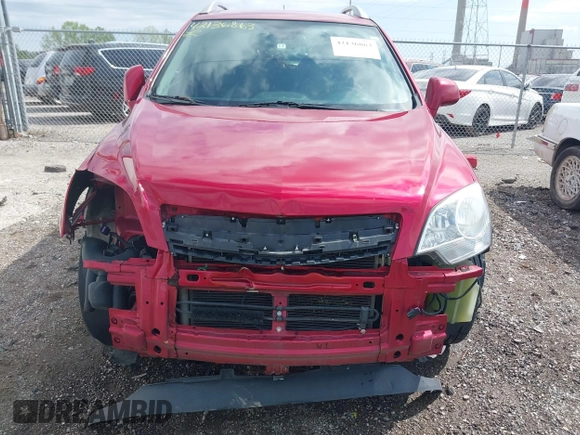 2014 Chevrolet Captiva Sport LS z VIN 3GNAL2EK8ES608616, wystawiony jako IAAI lot #42136863 z przebiegiem 185 748 mil mil oraz . Historia ofert i sprzedaży dostępna na DreamBid. Obrazek 13.