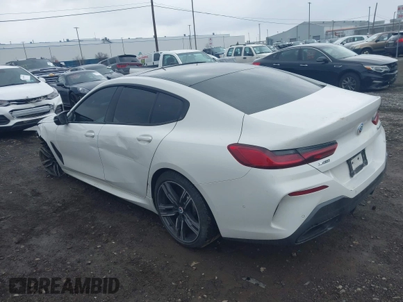 2023 BMW 8 Series M850i with VIN WBAGV8C06PCK97193, listed as a IAAI auction lot 41888779 with 40,845 mi miles and . Bid and sale history available at DreamBid. Image 3.