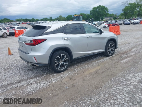 2016 Lexus RX 350 with VIN 2T2BZMCA6GC035793, listed as a IAAI auction lot 42049370 with 136,116 mi miles and . Bid and sale history available at DreamBid. Image 4.
