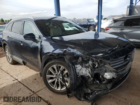 2018 Mazda CX-9 Grand Touring z VIN JM3TCADY2J0220873, wystawiony jako Copart lot #49264875 z przebiegiem Nie podano mil oraz Szkoda całkowita • Salvage title. Historia ofert i sprzedaży dostępna na DreamBid. Obrazek 4.
