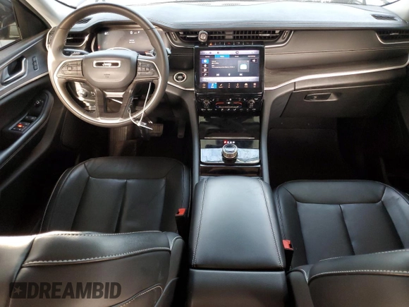 2023 Jeep Grand Cherokee Limited with VIN 1C4RJGBG2PC509653, listed as a Copart auction lot 85526294 with 32,662 mi miles and Salvage title. Bid and sale history available at DreamBid. Image 8.