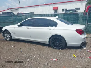 2015 BMW 7 Series 750Li xDrive with VIN WBAYF8C57FD655004, listed as a IAAI auction lot 42272205 with 77,677 mi miles and . Bid and sale history available at DreamBid. Image 15.