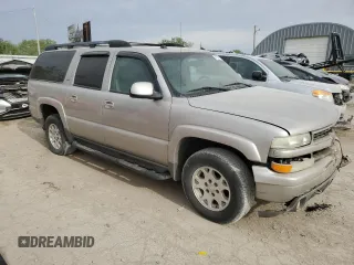 2005 Chevrolet Suburban Z71 with VIN 3GNFK16ZX5G110659, listed as a Copart auction lot 51700115 with 223,329 mi miles and Salvage title. Bid and sale history available at DreamBid. Image 4.
