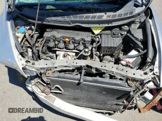 2009 Honda Civic LX z VIN 2HGFA165X9H333316, wystawiony jako Copart lot #55697715 z przebiegiem Nie podano mil oraz Szkody całkowita. Historia ofert i sprzedaży dostępna na DreamBid. Obrazek 11.